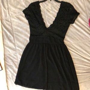 Black little dress with lace detailing on top